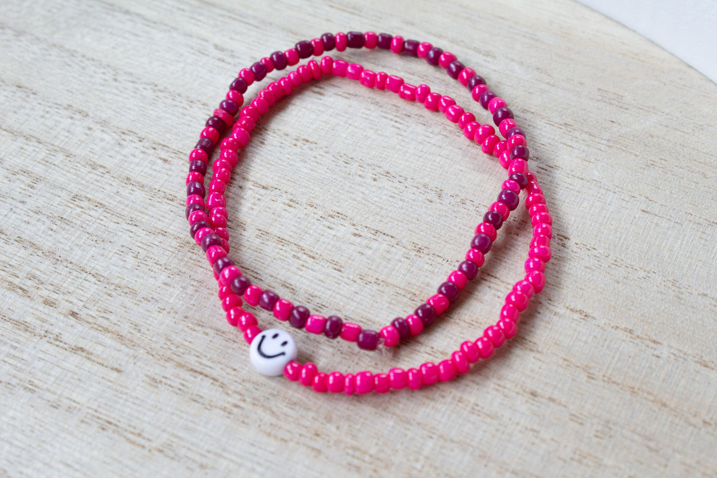 Perlenarmband pink mit Smiley