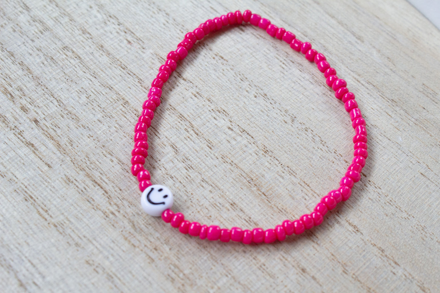 Perlenarmband pink mit Smiley
