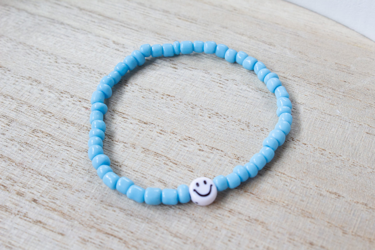 Perlenarmband türkis mit Smiley