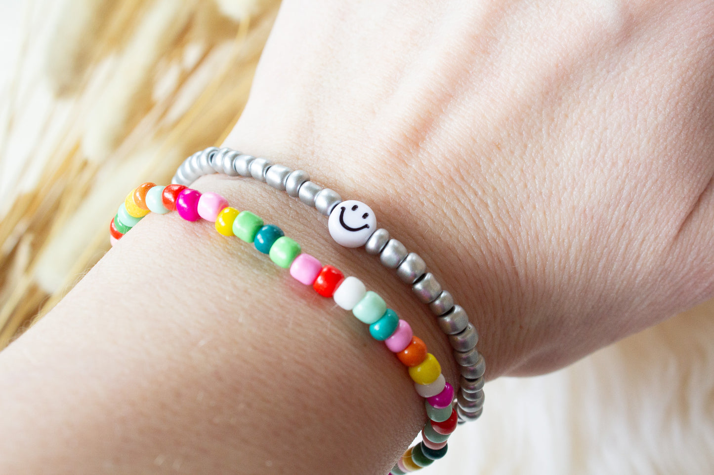Perlenarmband silber/grau mit Smiley