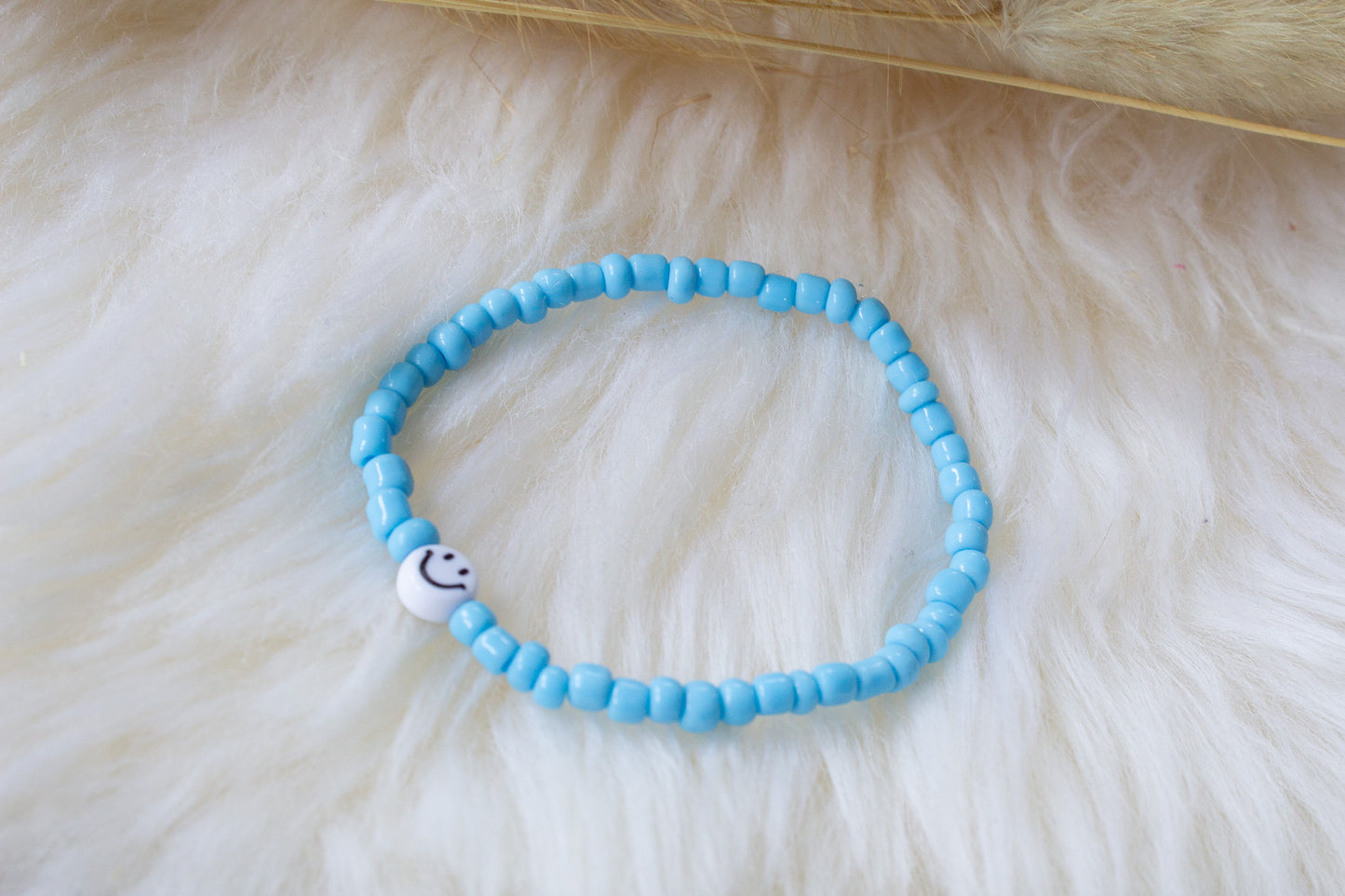 Perlenarmband türkis mit Smiley