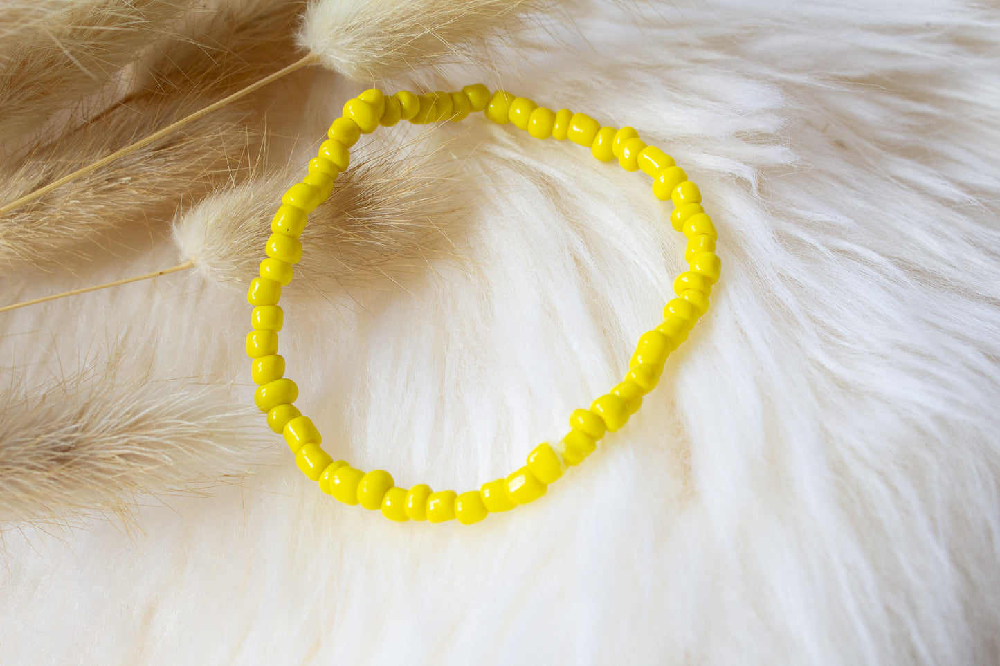 Perlenarmband gelb