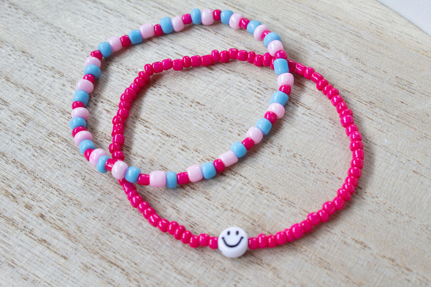 Perlenarmband pink mit Smiley