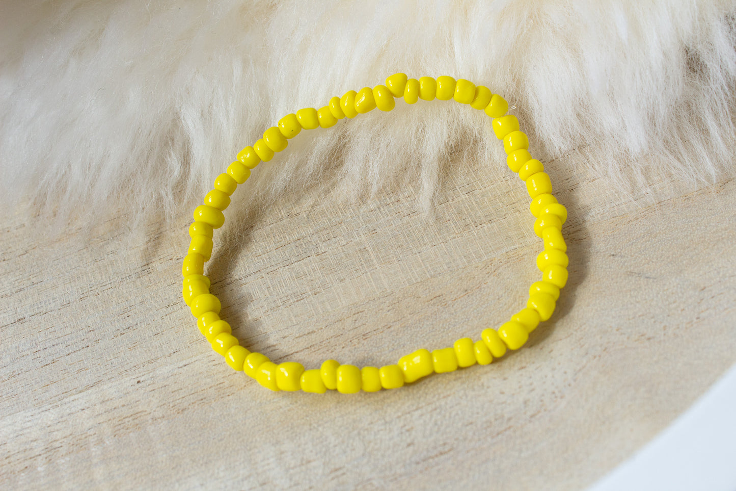 Perlenarmband gelb